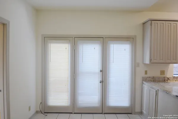 a view of cabinets and window