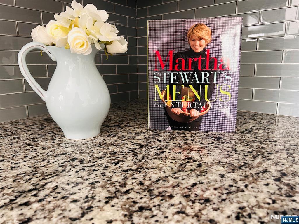 880 Briarwoods Road Franklin Lakes, NJ 07417 - Photo 27 of 27 a bathroom with a sink and a mirror