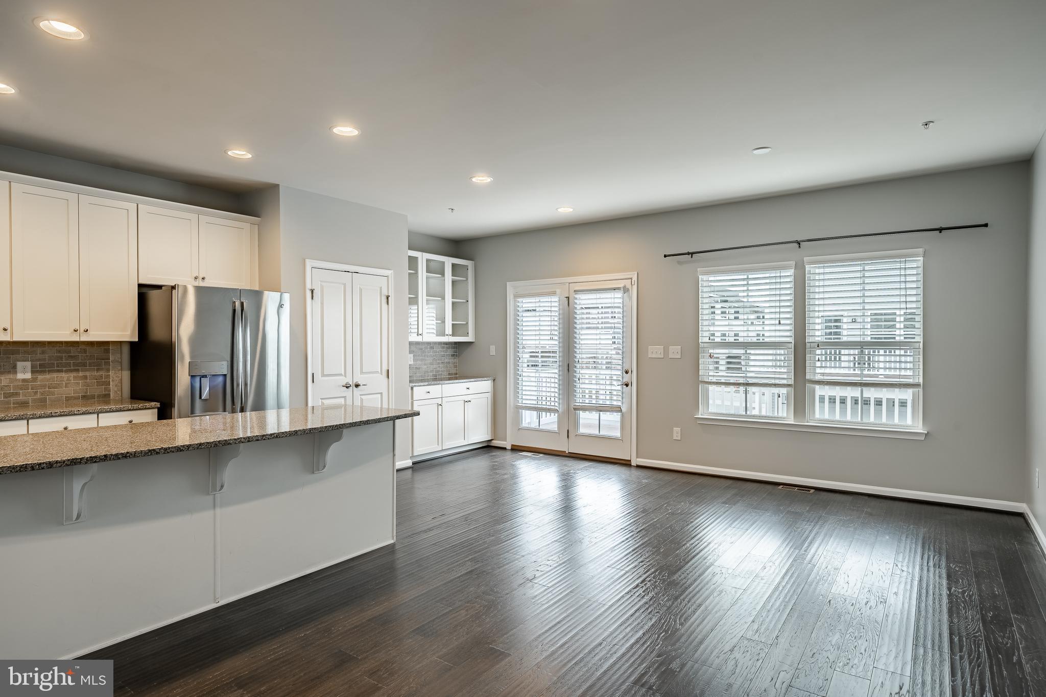 112 Patriots Path Malvern, PA 19355 - Photo 14 of 38 Dining area with Glass French doors to deck