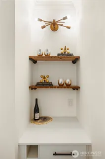 a kitchen with a sink and a microwave