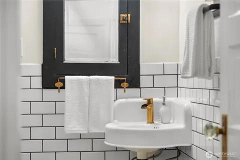 a bathroom with a sink and a bathtub