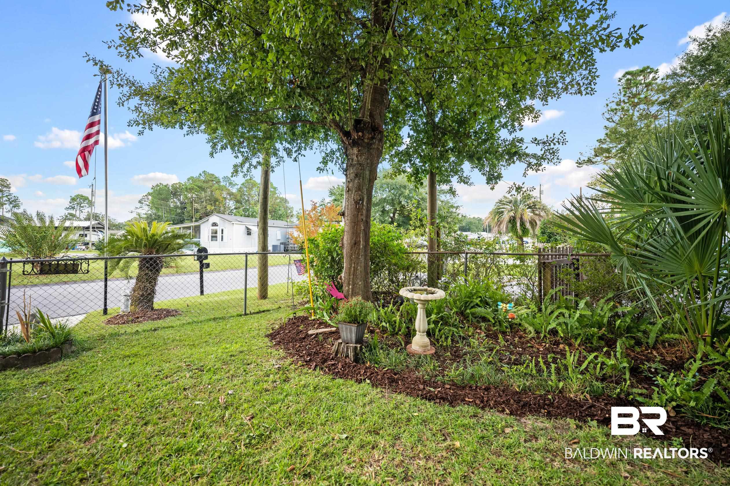 271 Defuniak Circle Lillian, AL 36549 - Photo 5 of 20 View of yard