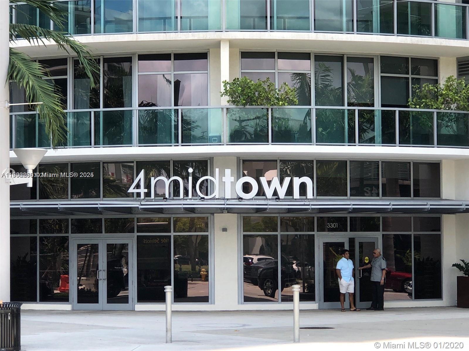 3301 Northeast 1st Avenue, Unit H1806 Miami, FL 33137 - Photo 13 of 22 a front view of a building with a glass windows