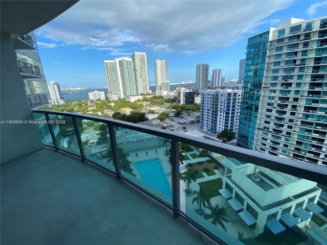 a view of a balcony with chairs