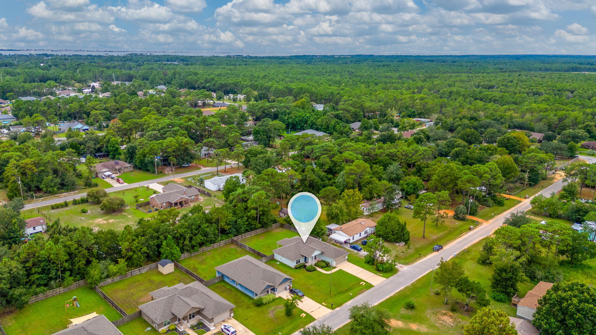 8177 Lucena Street Navarre, FL 32566 - Photo 48 of 51 a view of yard with outdoor seating