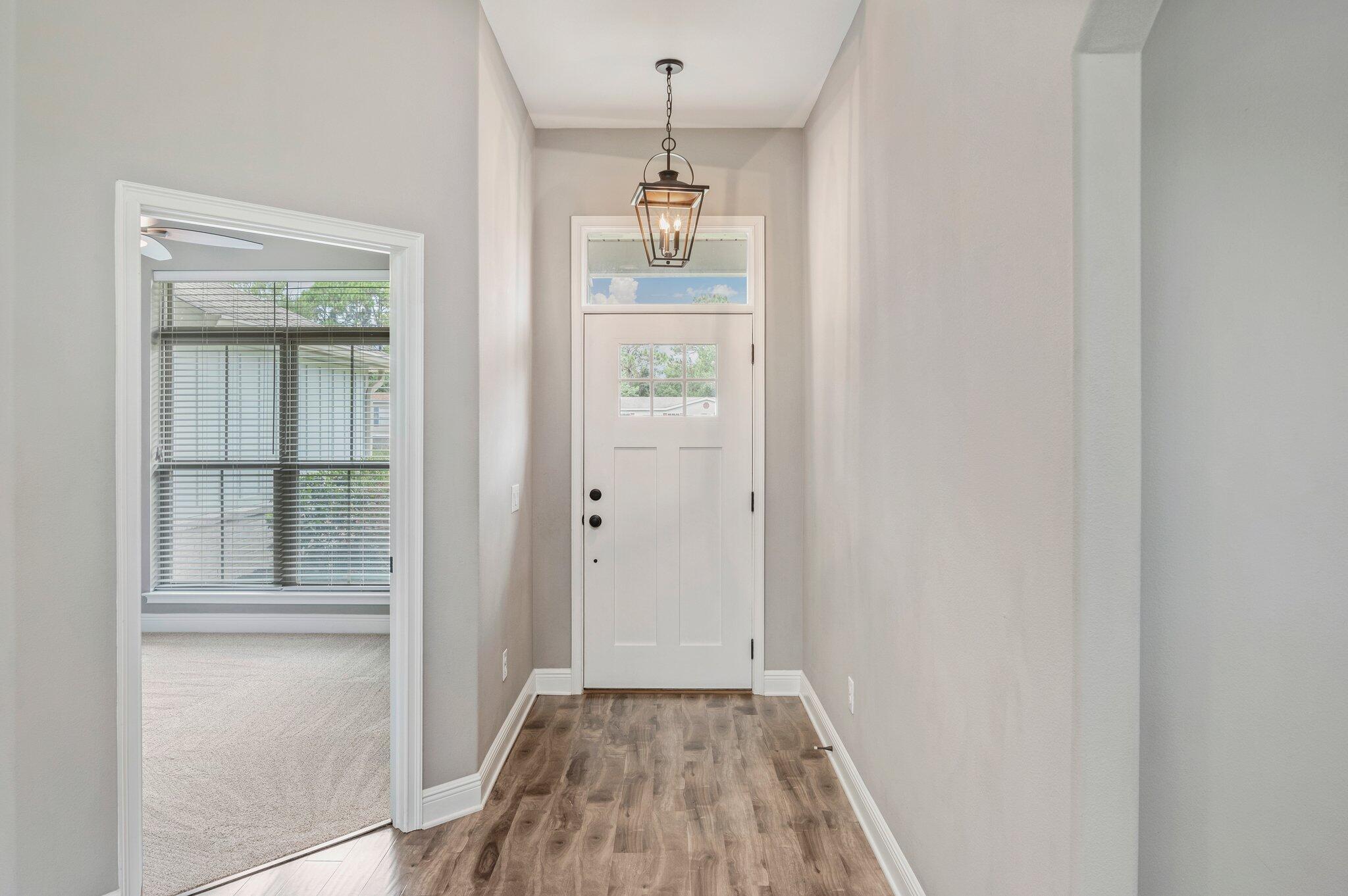 8177 Lucena Street Navarre, FL 32566 - Photo 5 of 51 a view of an entryway door
