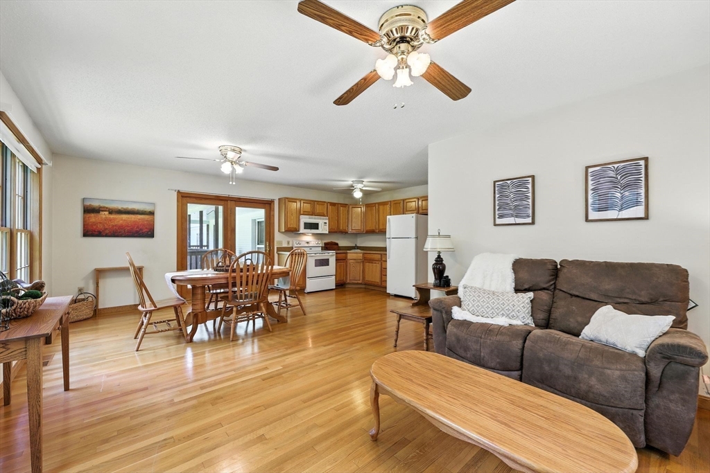285 Lower Hampden Road Monson, MA 01057 - Photo 19 of 40 a living room with furniture kitchen view and a large window