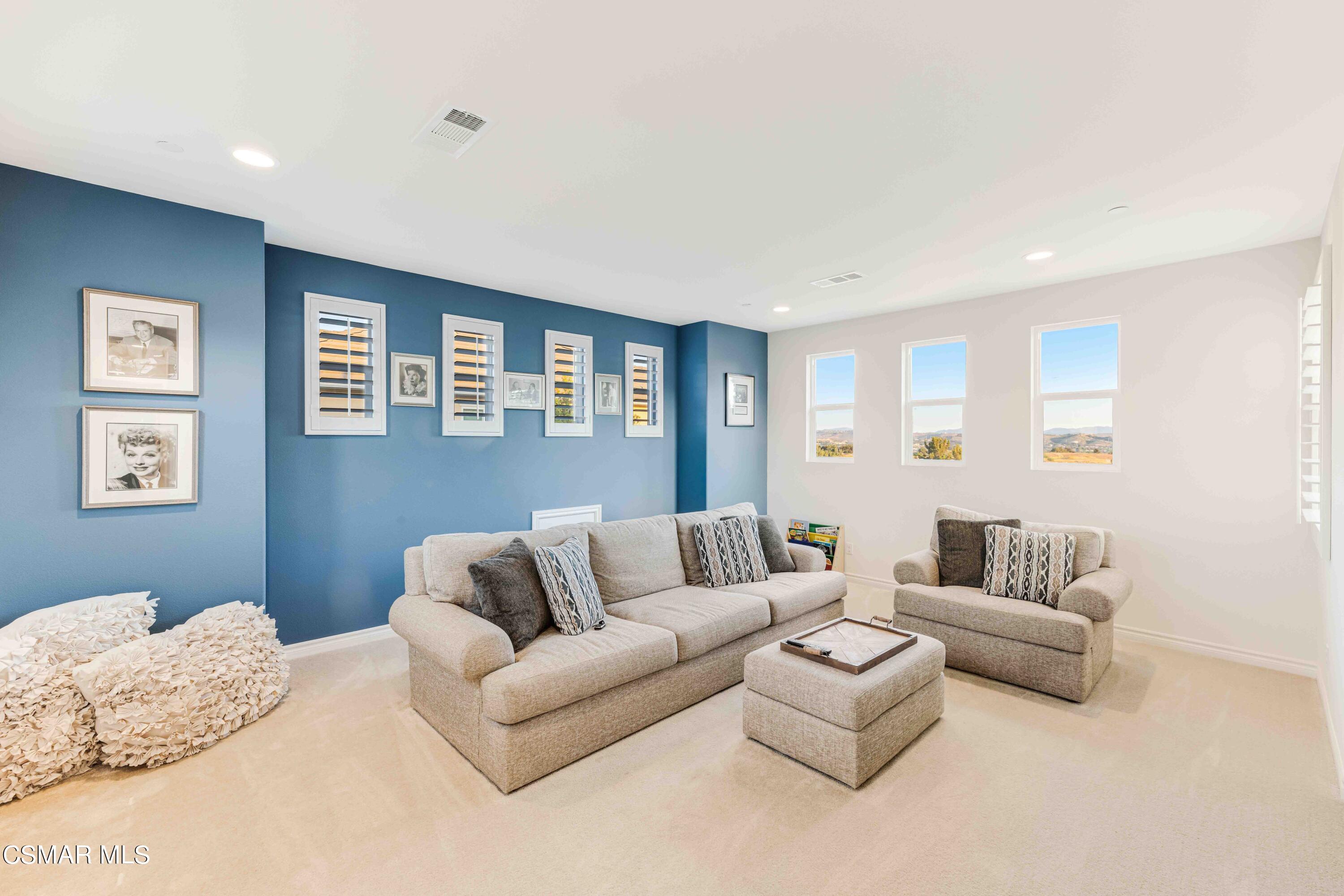 13210 Bent Grass Place Moorpark, CA 93021 - Photo 25 of 73 a living room with furniture and a large window