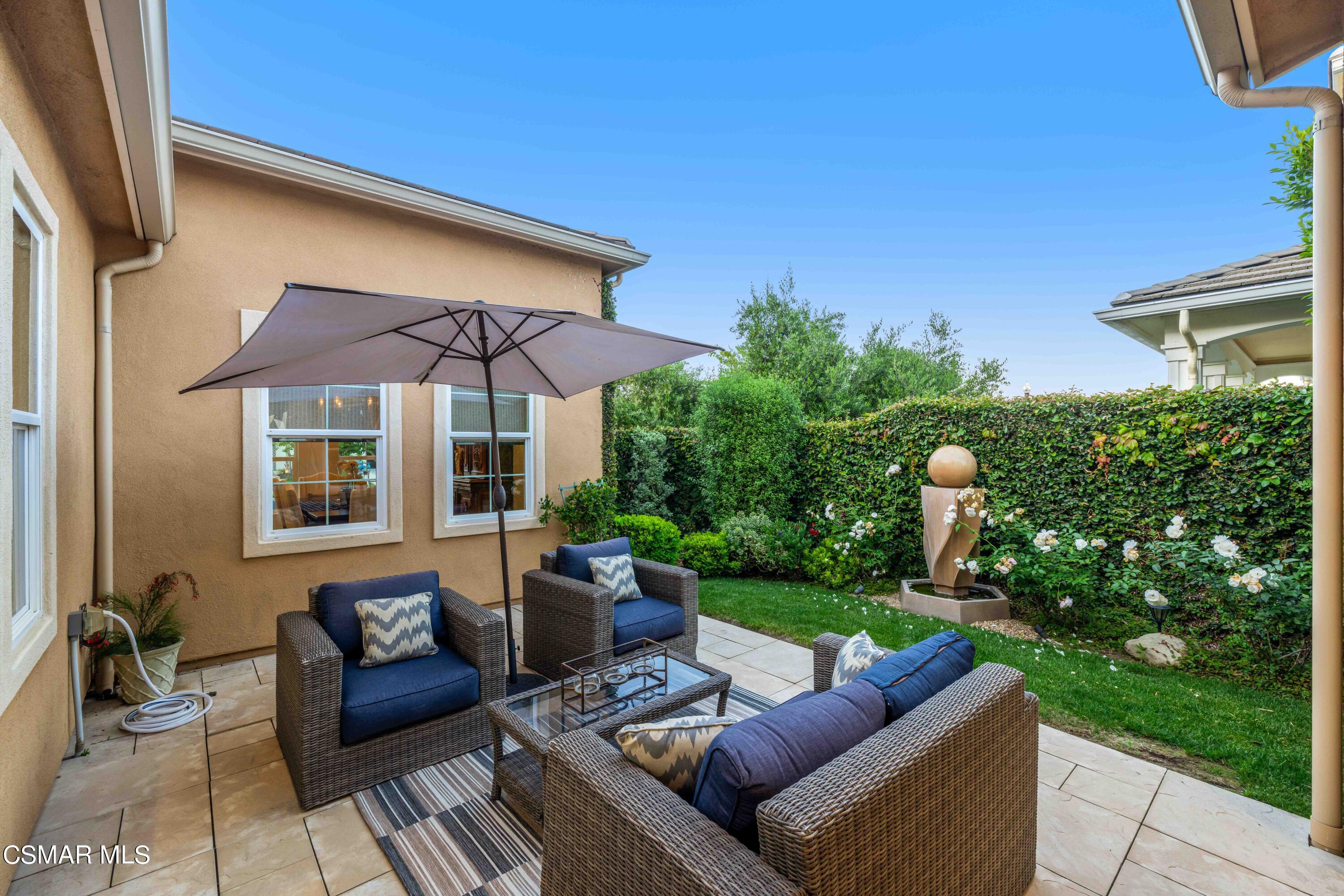 13210 Bent Grass Place Moorpark, CA 93021 - Photo 44 of 73 a view of a house with backyard sitting area and garden