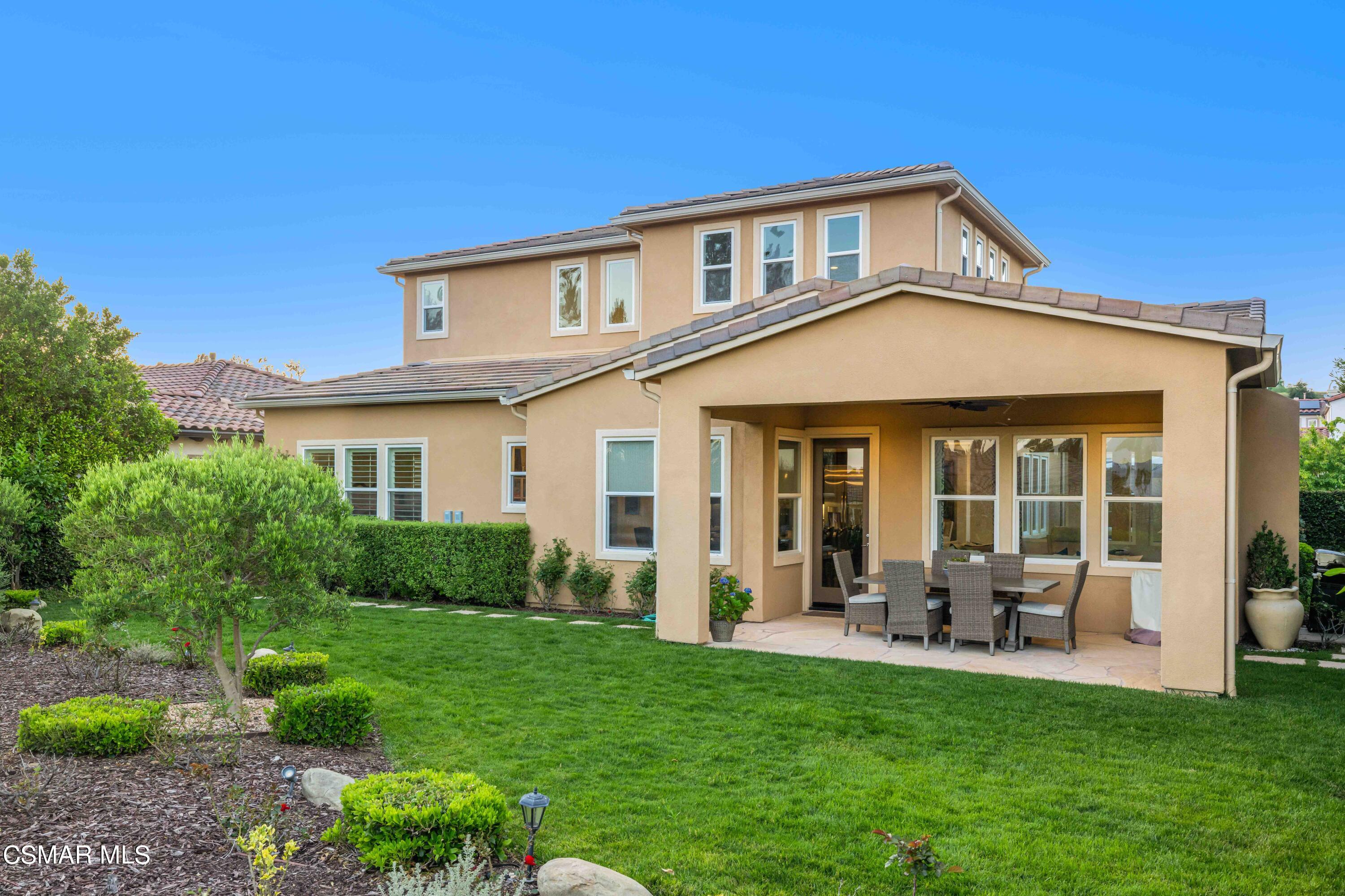 13210 Bent Grass Place Moorpark, CA 93021 - Photo 50 of 73 a front view of a house with a yard