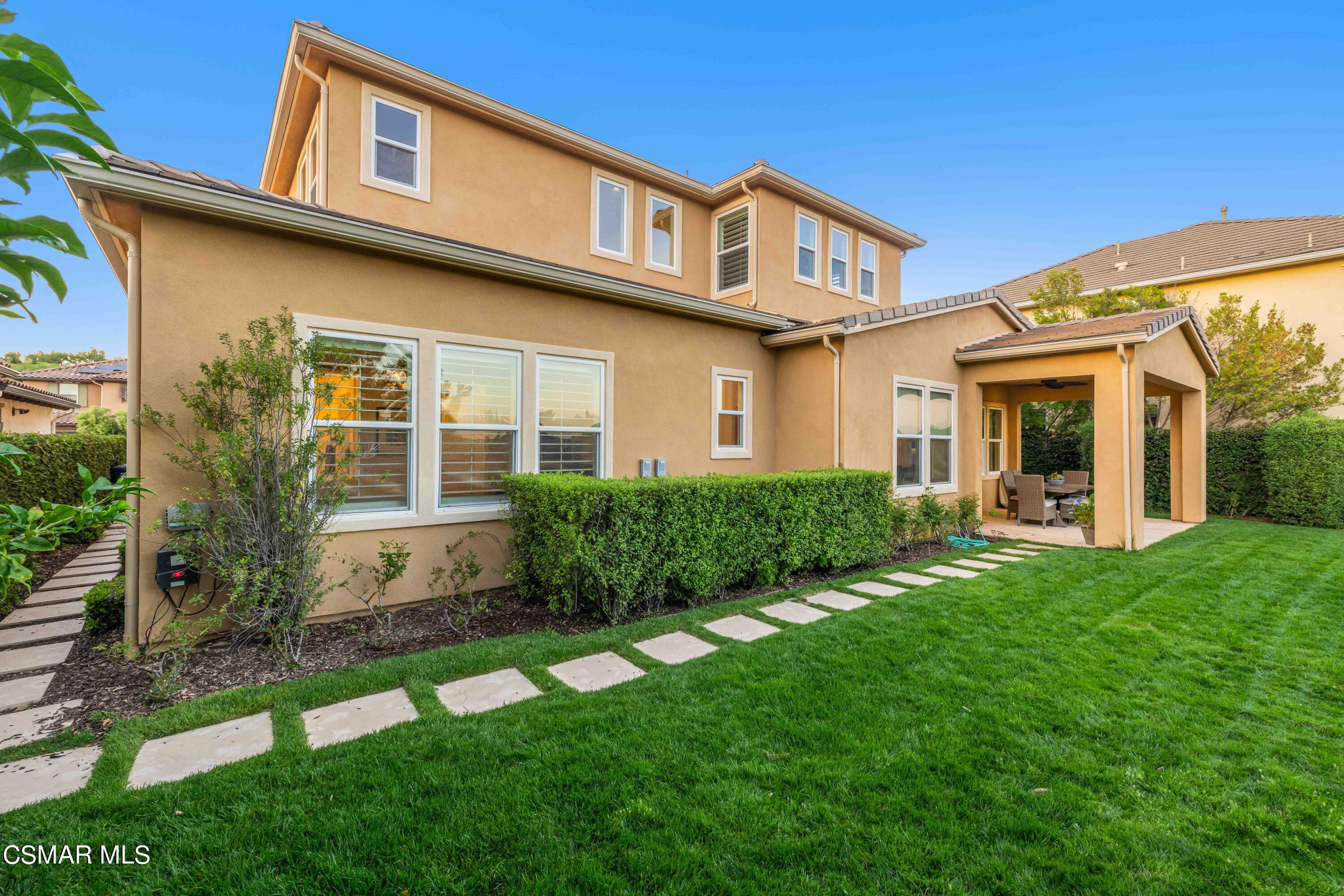 13210 Bent Grass Place Moorpark, CA 93021 - Photo 51 of 73 a front view of a house with a yard