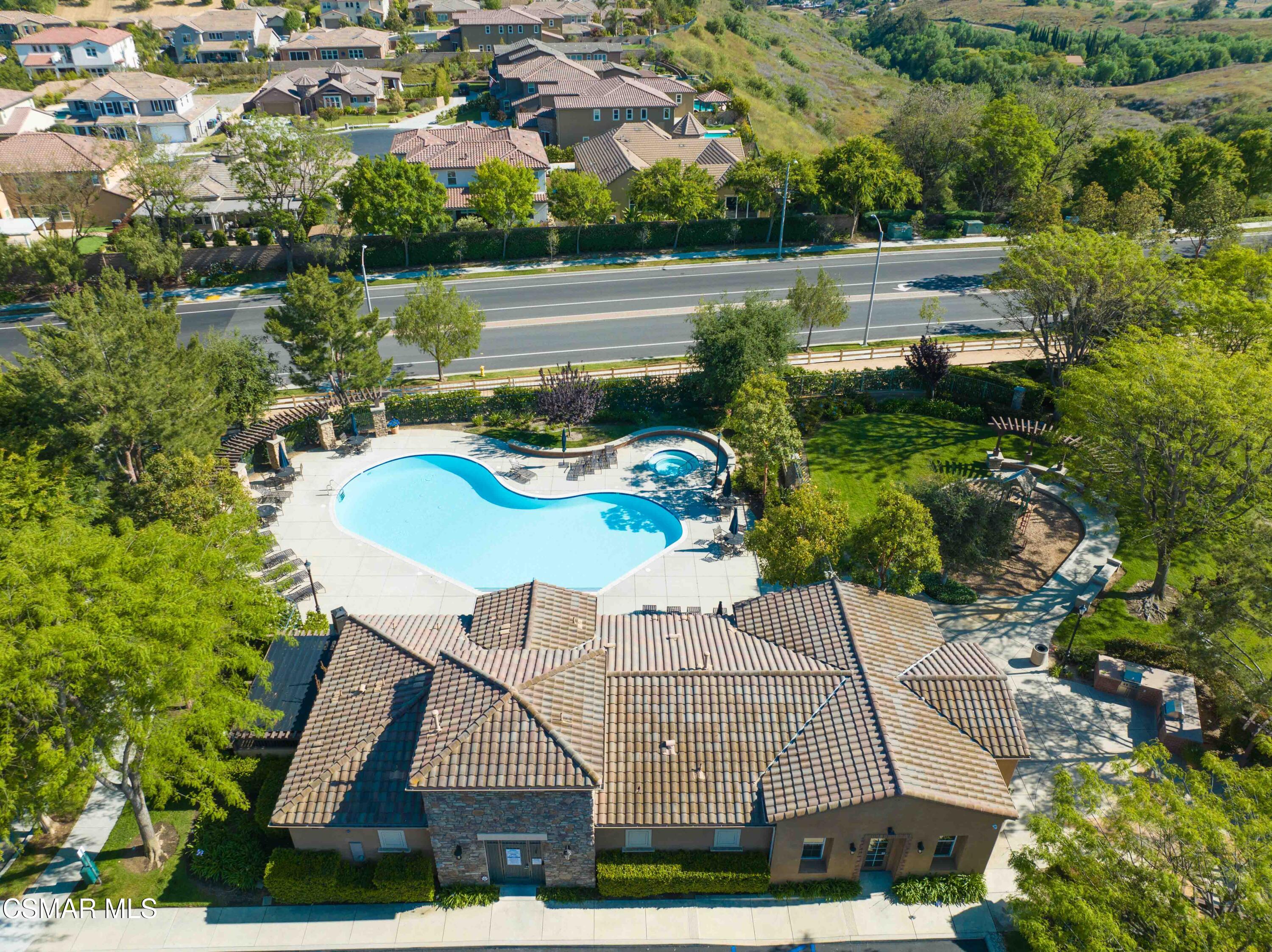 13210 Bent Grass Place Moorpark, CA 93021 - Photo 69 of 73 an aerial view of a house with swimming pool and lake view