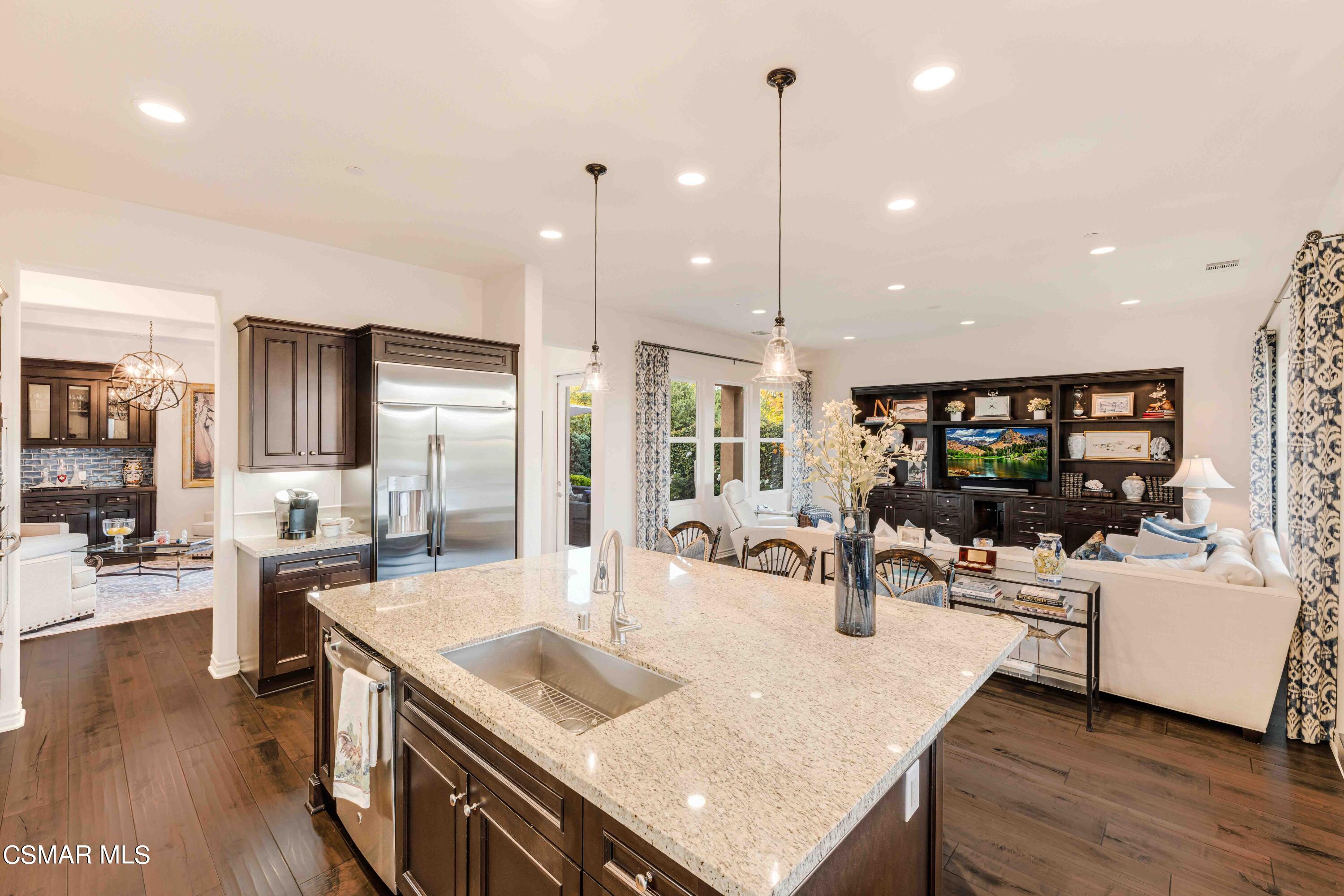 13210 Bent Grass Place Moorpark, CA 93021 - Photo 10 of 73 a kitchen with counter space and living room