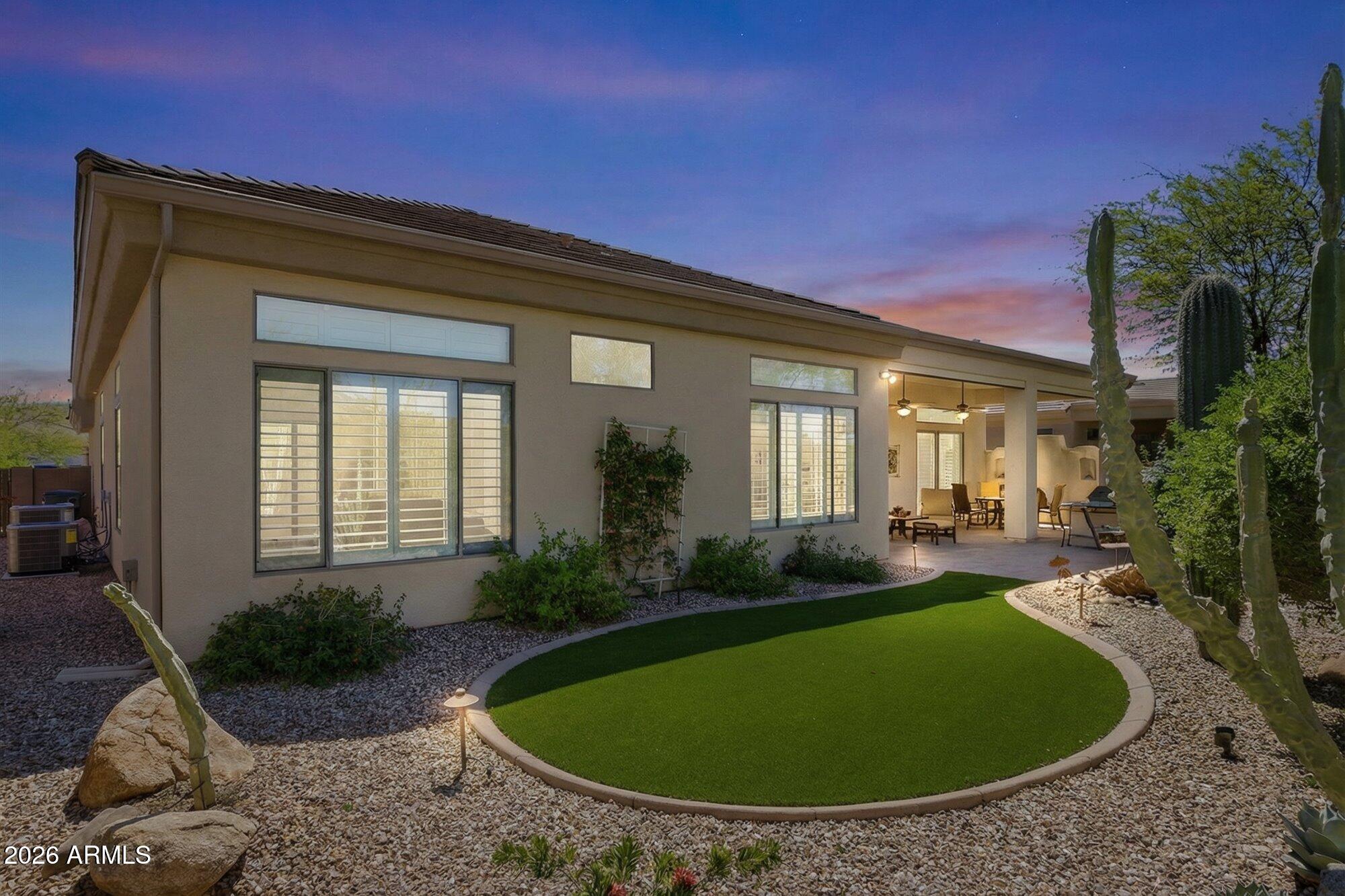 40118 North Lytham Way Phoenix, AZ 85086 - Photo 38 of 40 Backyard in evening