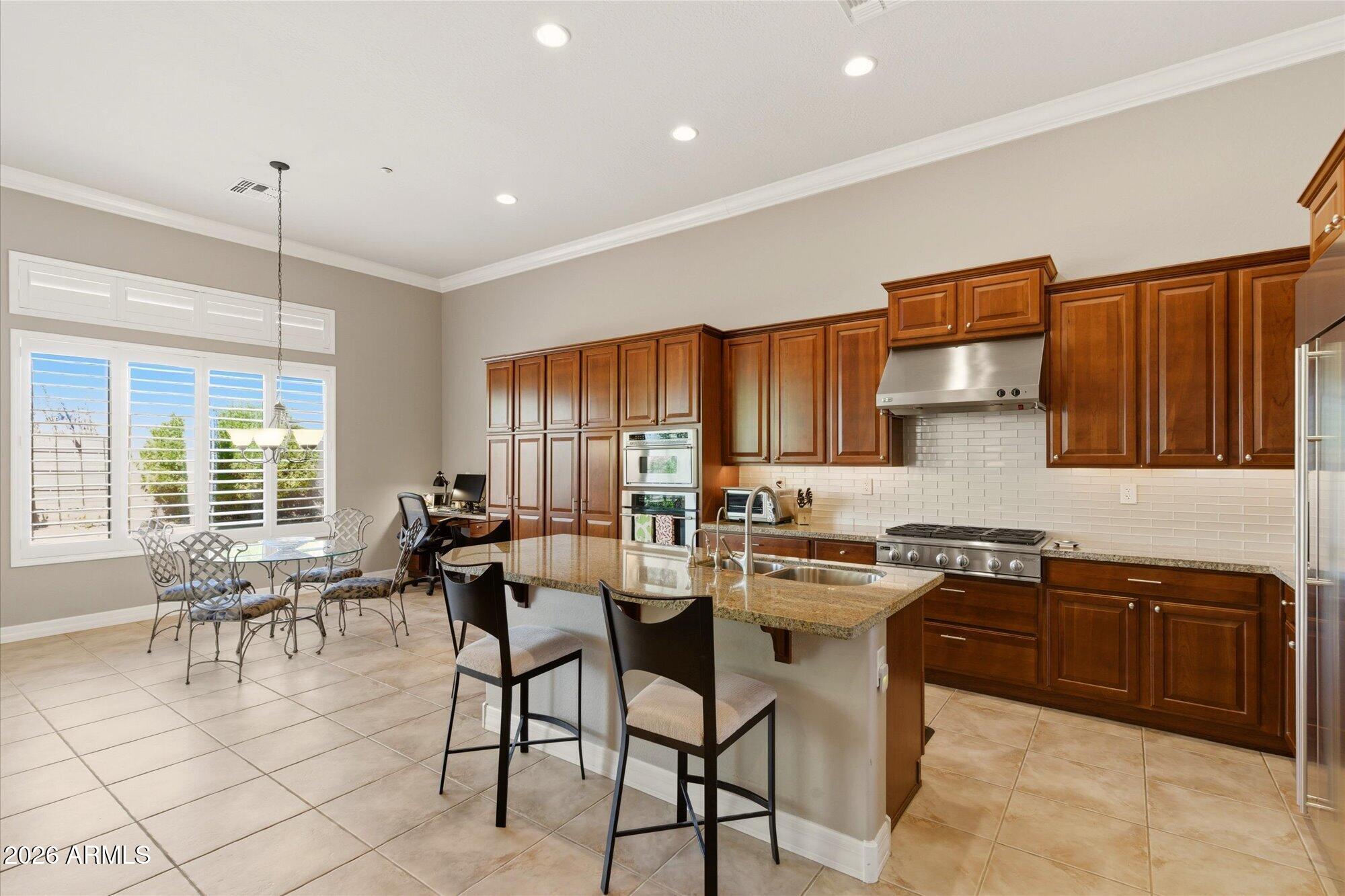 40118 North Lytham Way Phoenix, AZ 85086 - Photo 10 of 40 Lots of kitchen cabinets