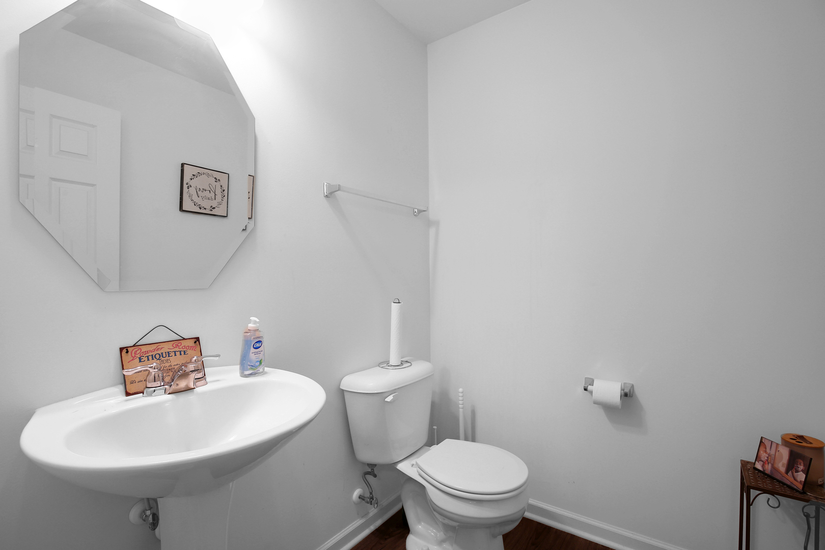 98 Lawrence Lane Matteson, IL 60443 - Photo 12 of 20 a white toilet sitting next to a white sink