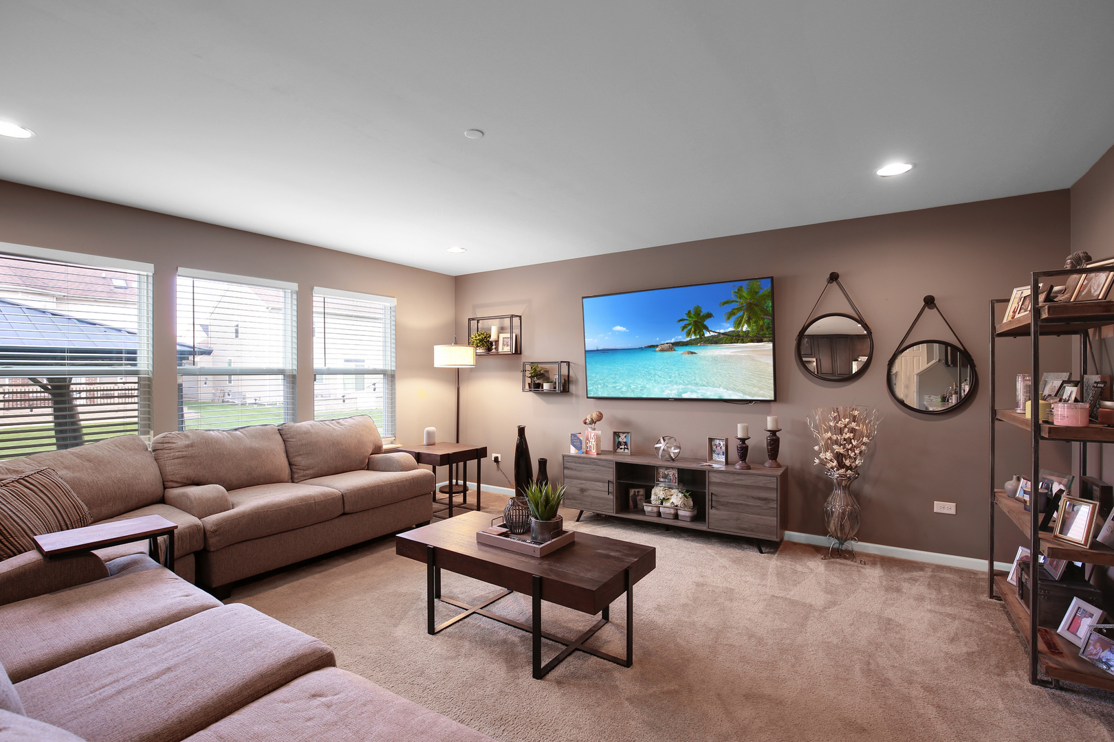 98 Lawrence Lane Matteson, IL 60443 - Photo 6 of 20 a living room with furniture a rug and white walls