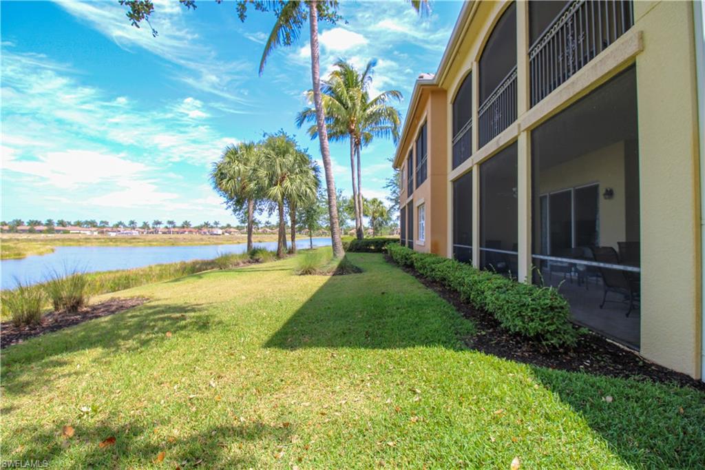 2713 Callista Court, Unit 103 Naples, FL 34114 - Photo 43 of 47 a view of a yard with an outdoor seating