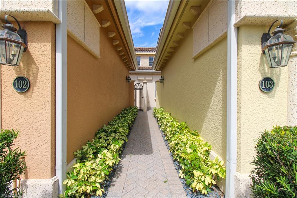 2713 Callista Court, Unit 103 Naples, FL 34114 - Photo 44 of 47 a view of a pathway of the house