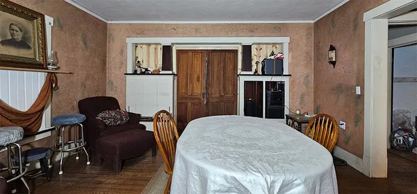 a bedroom with a bed and dresser