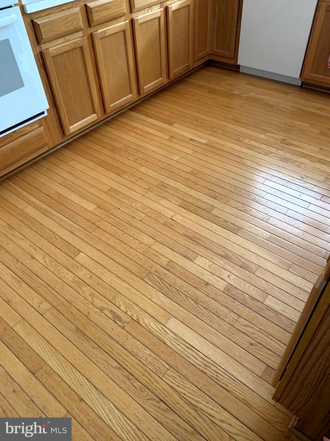 2701 Summers Ridge Drive Odenton, MD 21113 - Photo 13 of 50 a view of an empty room with wooden floor