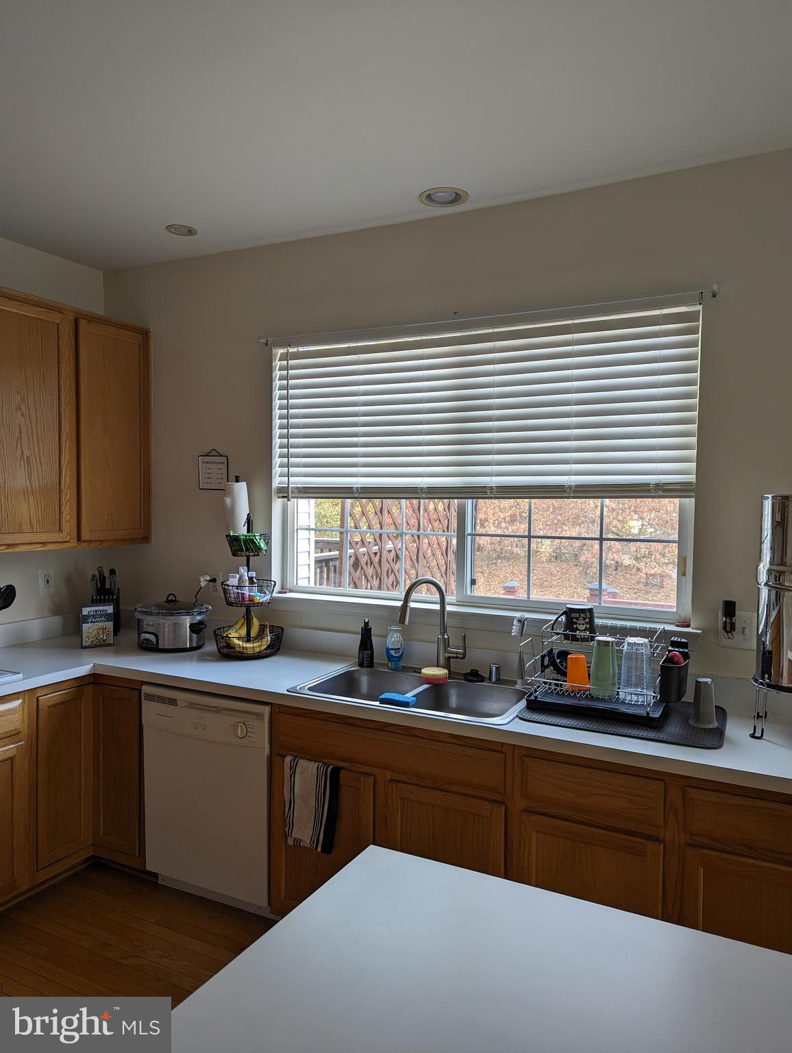 2701 Summers Ridge Drive Odenton, MD 21113 - Photo 10 of 50 a kitchen with a sink a window and cabinets