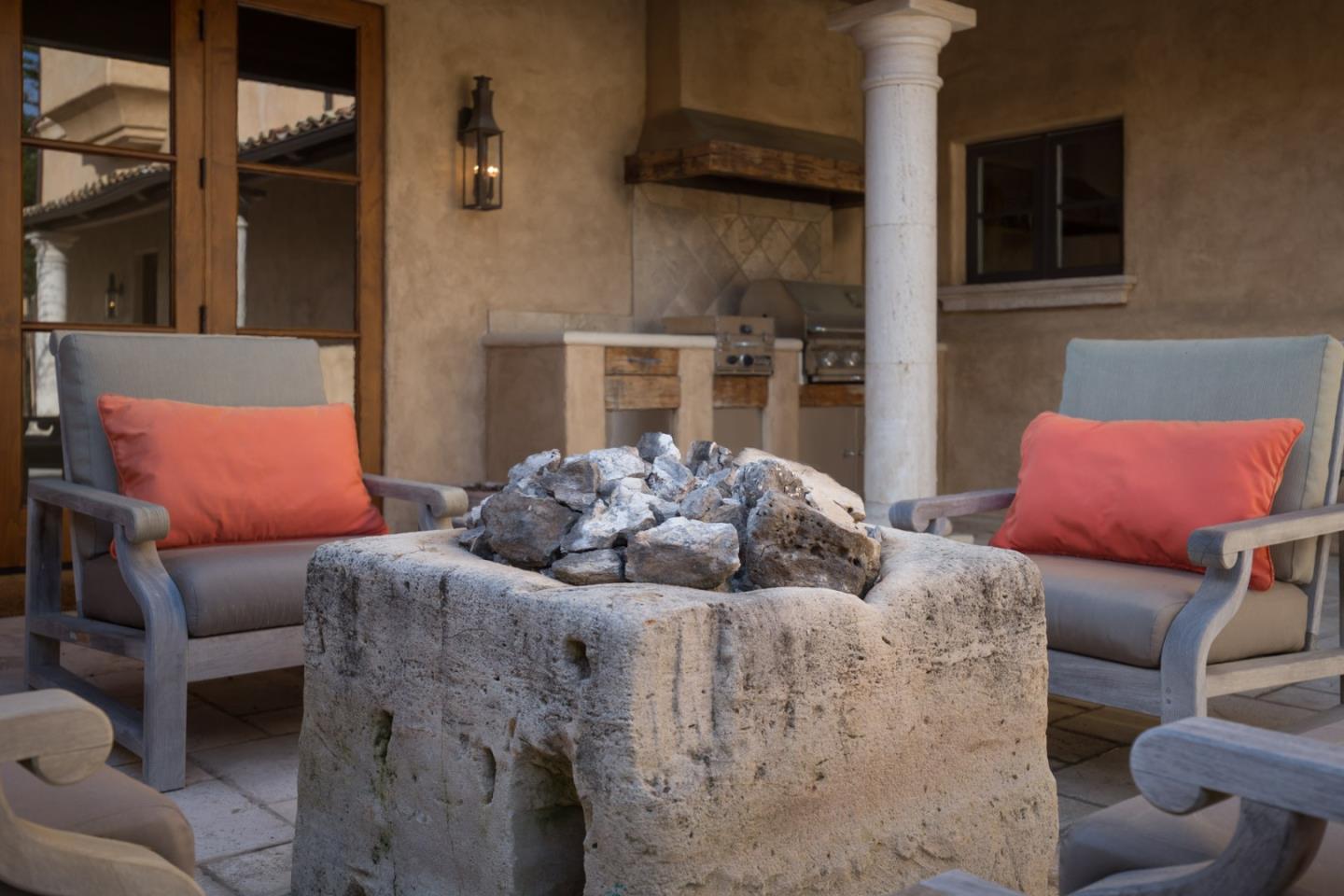 Padre Lane Pebble Beach, CA 93953 - Photo 14 of 25 a living room with furniture and a fireplace