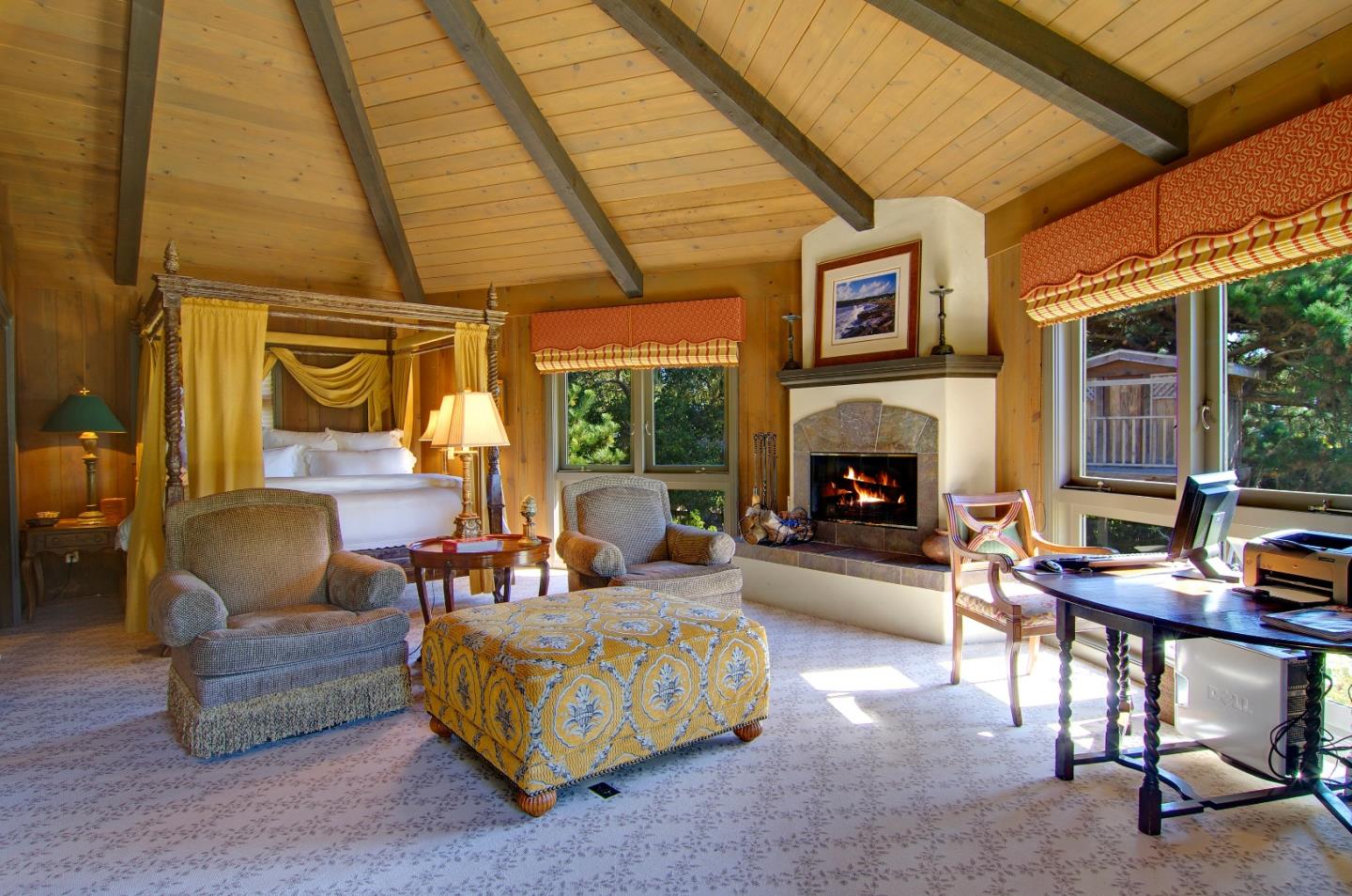 Padre Lane Pebble Beach, CA 93953 - Photo 18 of 25 a living room with furniture and a fireplace