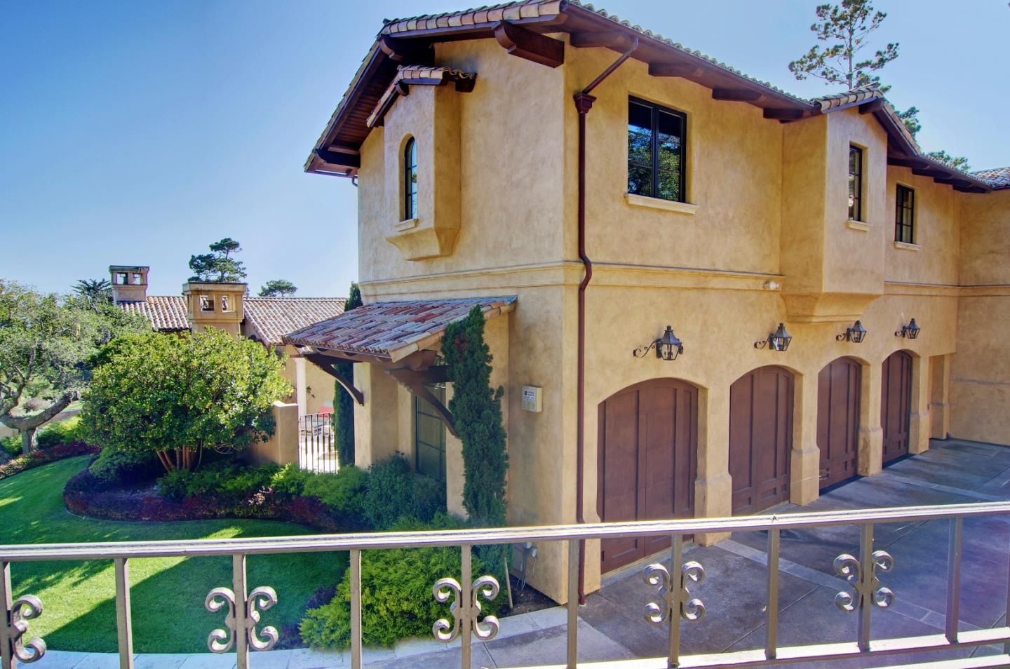 Padre Lane Pebble Beach, CA 93953 - Photo 19 of 25 a front view of a house with a porch
