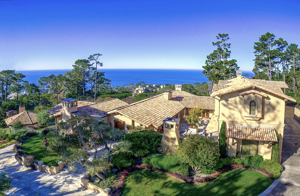 Padre Lane Pebble Beach, CA 93953 - Photo 21 of 25 a view of a house with a yard and potted plants