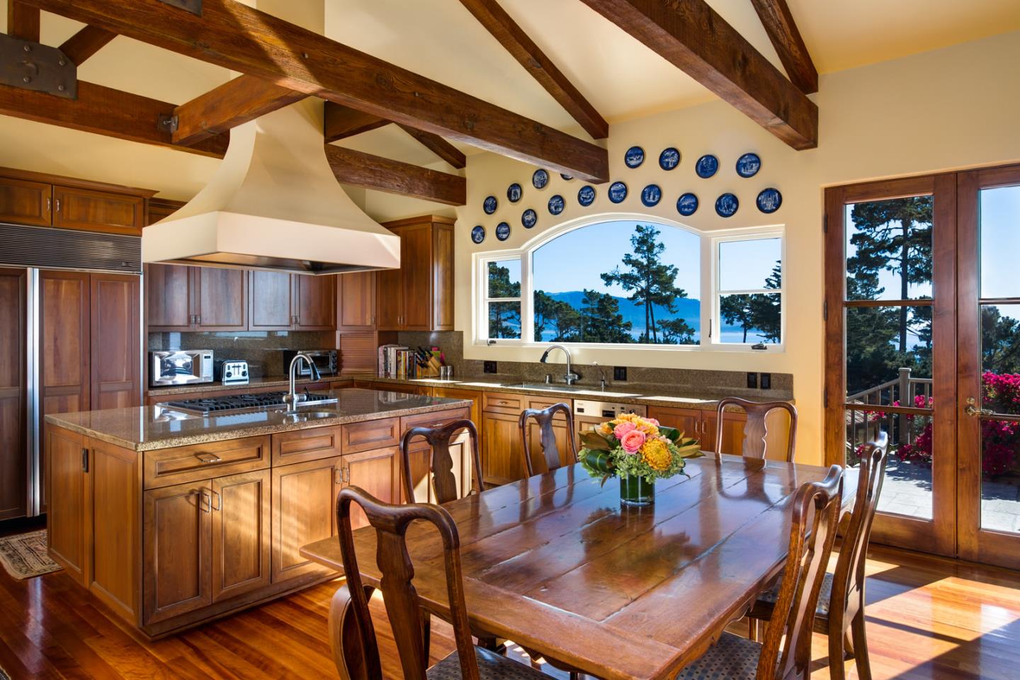 Padre Lane Pebble Beach, CA 93953 - Photo 8 of 25 a dining table with chairs and table in it