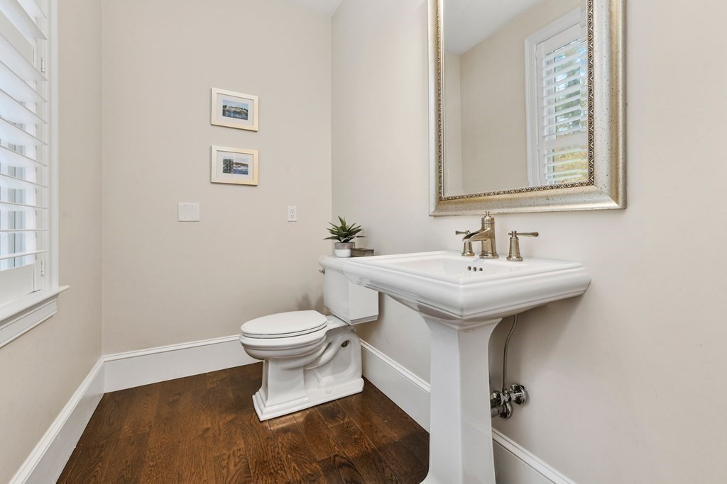 4 Fox Run Way Hingham, MA 02043 - Photo 12 of 34 a bathroom with a sink toilet and a mirror