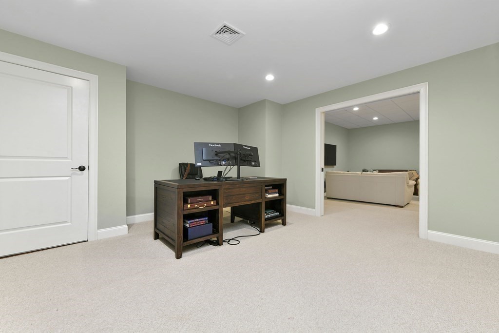 4 Fox Run Way Hingham, MA 02043 - Photo 26 of 34 a room with furniture and a flat screen tv