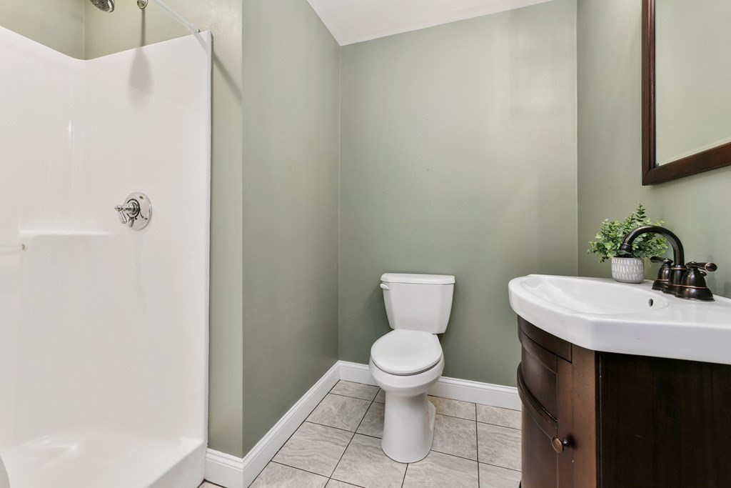 4 Fox Run Way Hingham, MA 02043 - Photo 30 of 34 a bathroom with a sink and a toilet