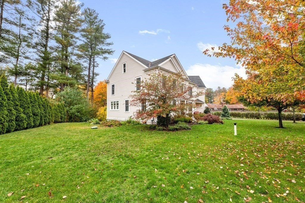 4 Fox Run Way Hingham, MA 02043 - Photo 33 of 34 a view of a house with a backyard