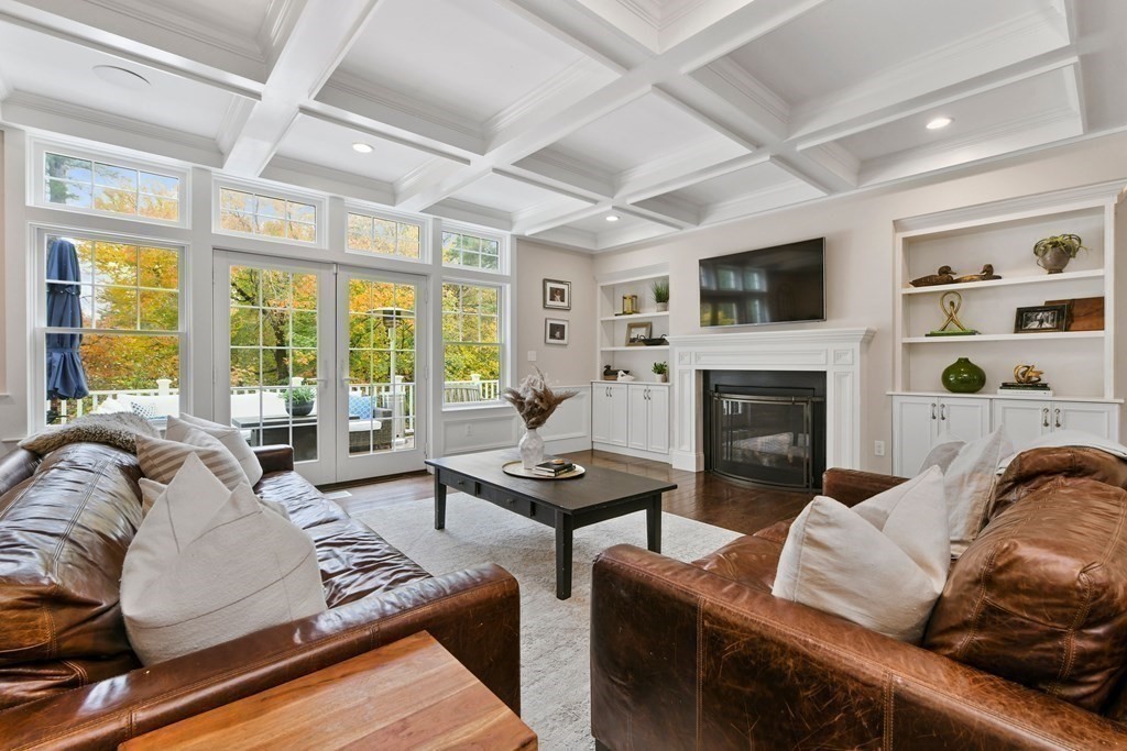 4 Fox Run Way Hingham, MA 02043 - Photo 6 of 34 a living room with furniture fireplace and a large window
