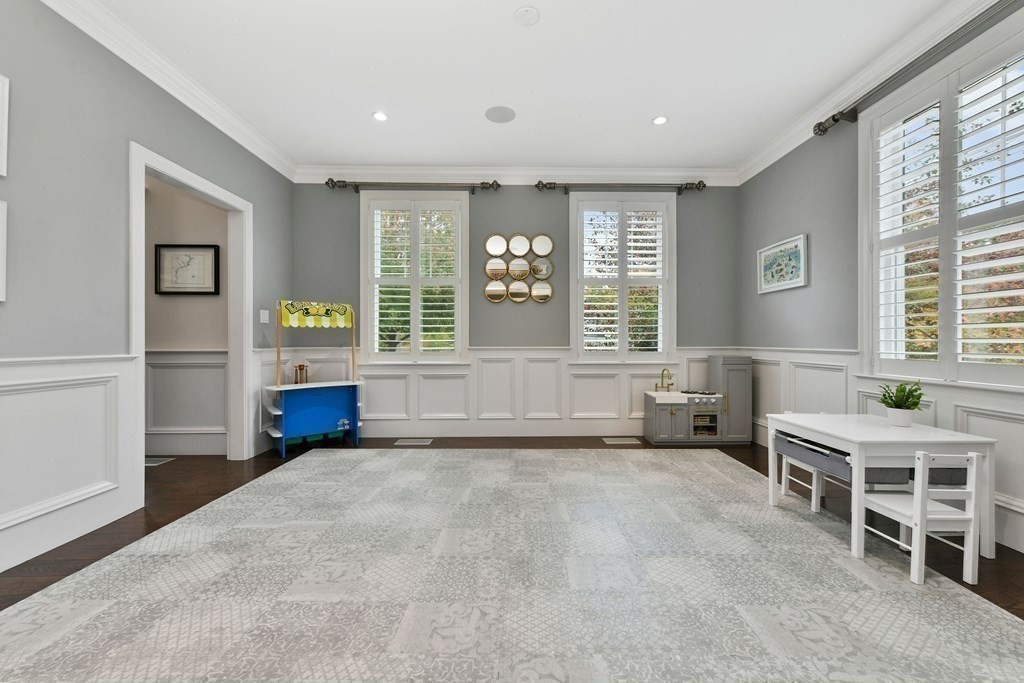 4 Fox Run Way Hingham, MA 02043 - Photo 10 of 34 a spacious bedroom with a bed and a window