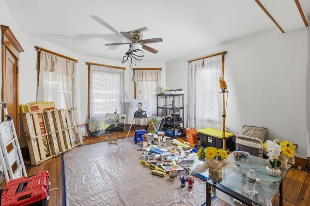 a room with furniture and a large window