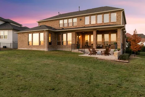 a view of a house with a swimming pool