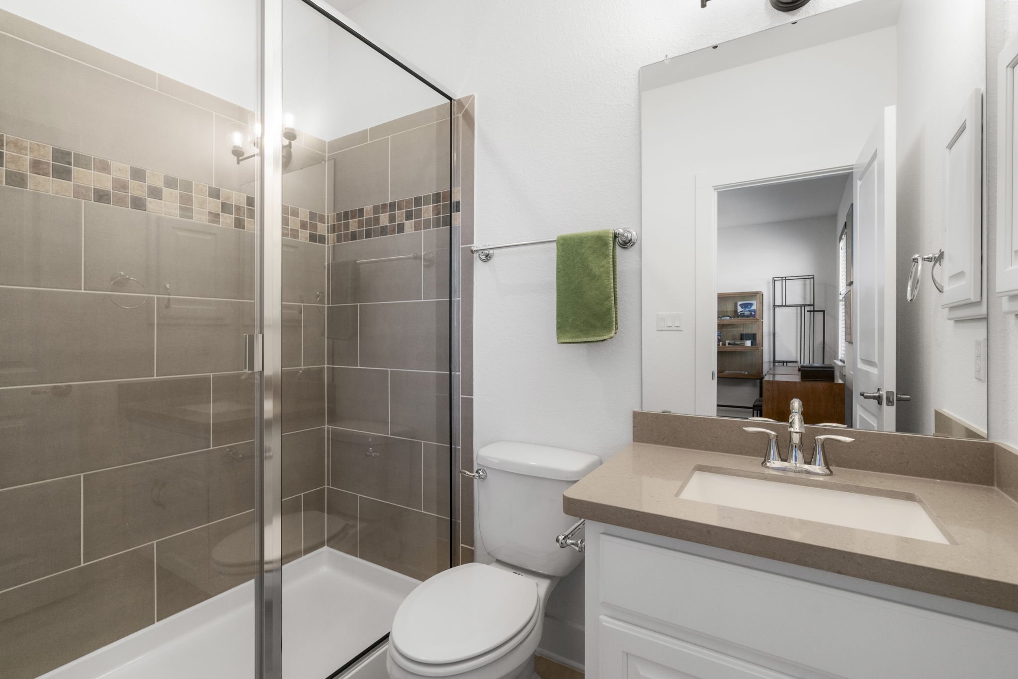 4704 Montorio Way Leander, TX 78641 - Photo 30 of 40 a bathroom with a sink toilet and shower