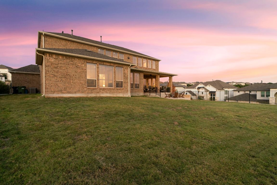 4704 Montorio Way Leander, TX 78641 - Photo 31 of 40 a front view of house with yard