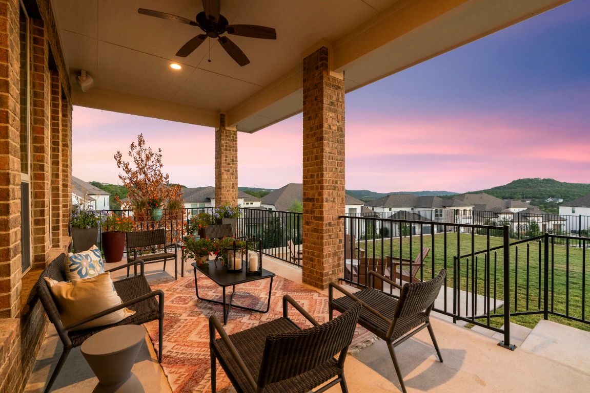 4704 Montorio Way Leander, TX 78641 - Photo 32 of 40 a view of a chairs and table in the balcony
