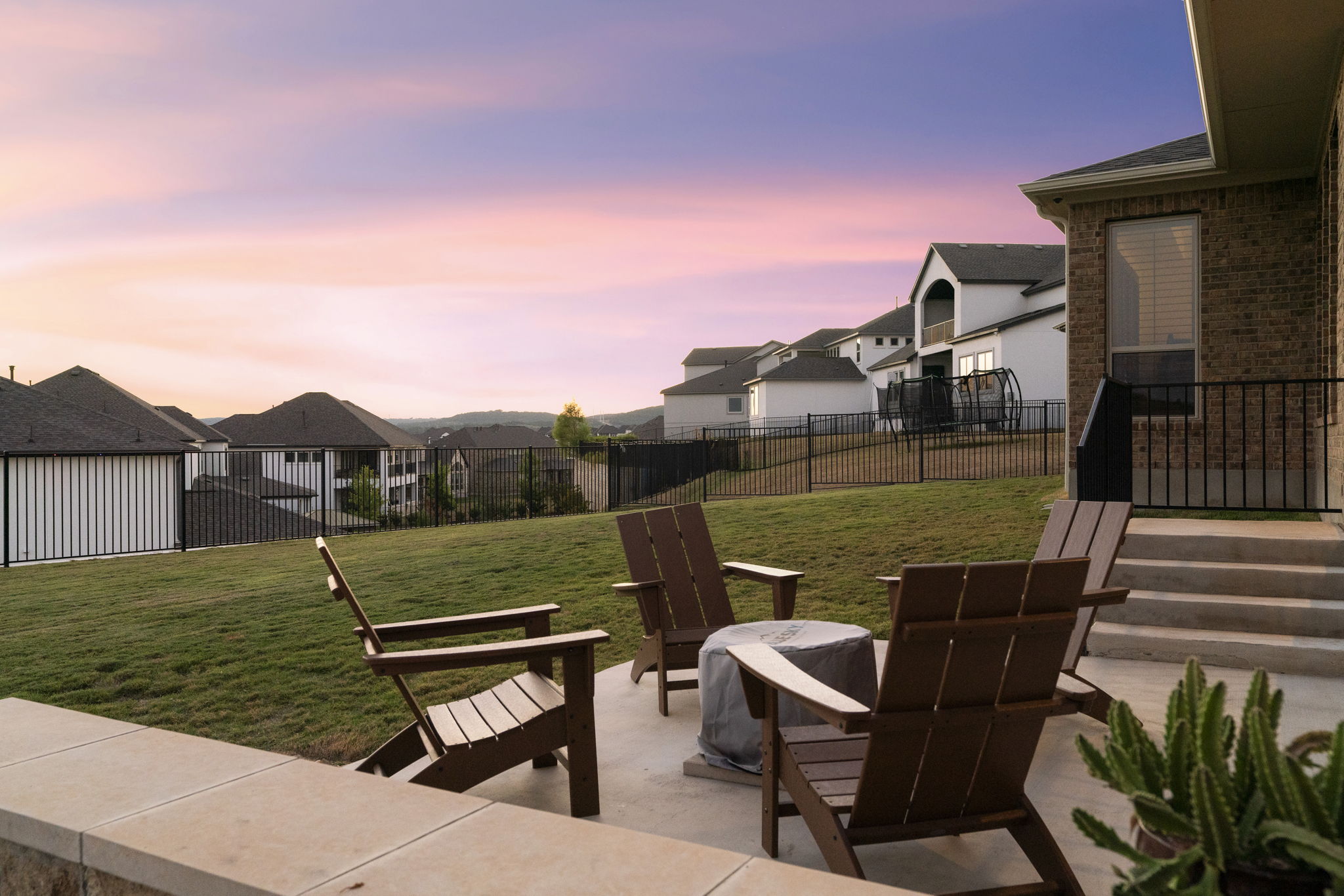 4704 Montorio Way Leander, TX 78641 - Photo 34 of 40 a view of a terrace with couches and wooden floor