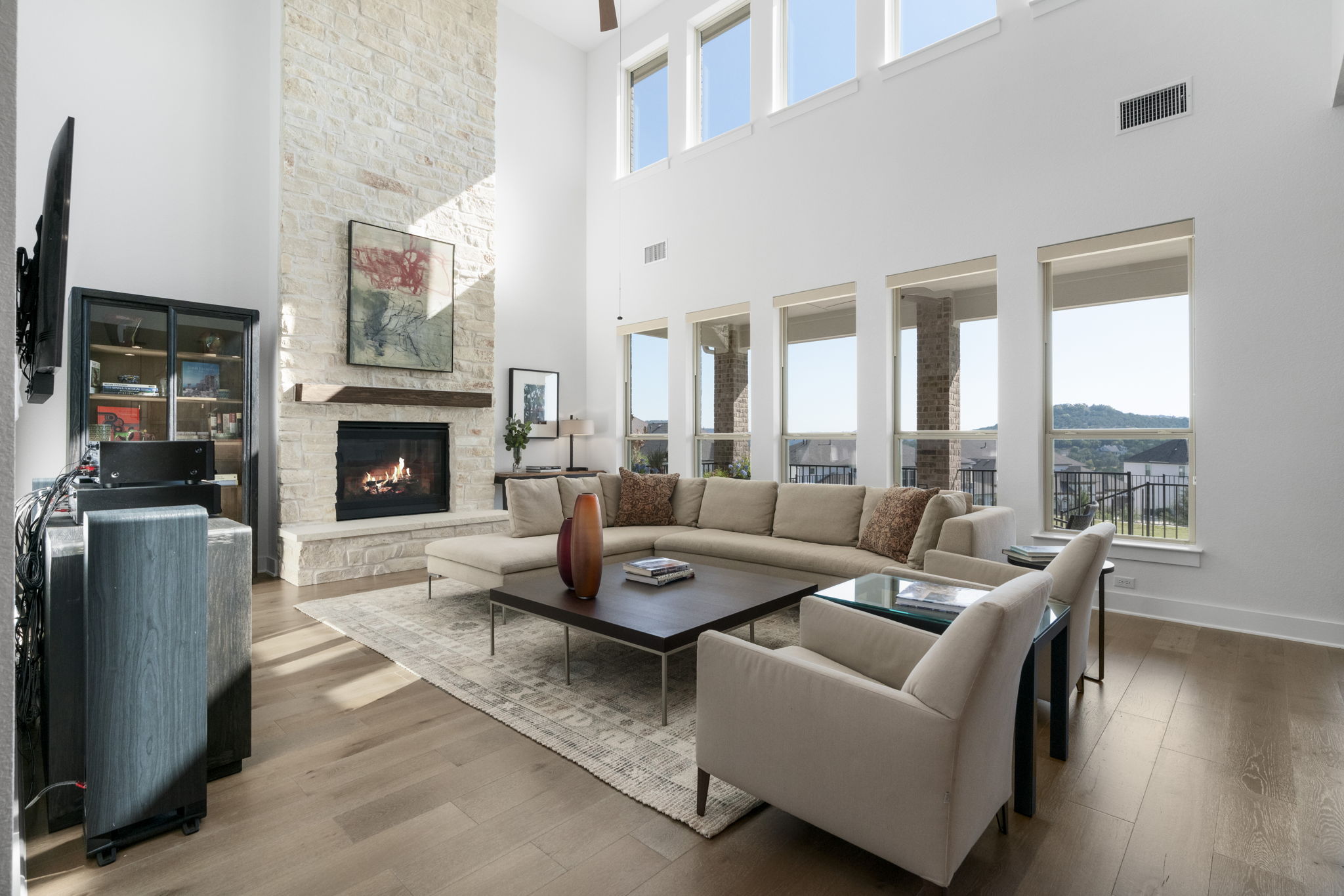 4704 Montorio Way Leander, TX 78641 - Photo 8 of 40 a living room with furniture and a fireplace