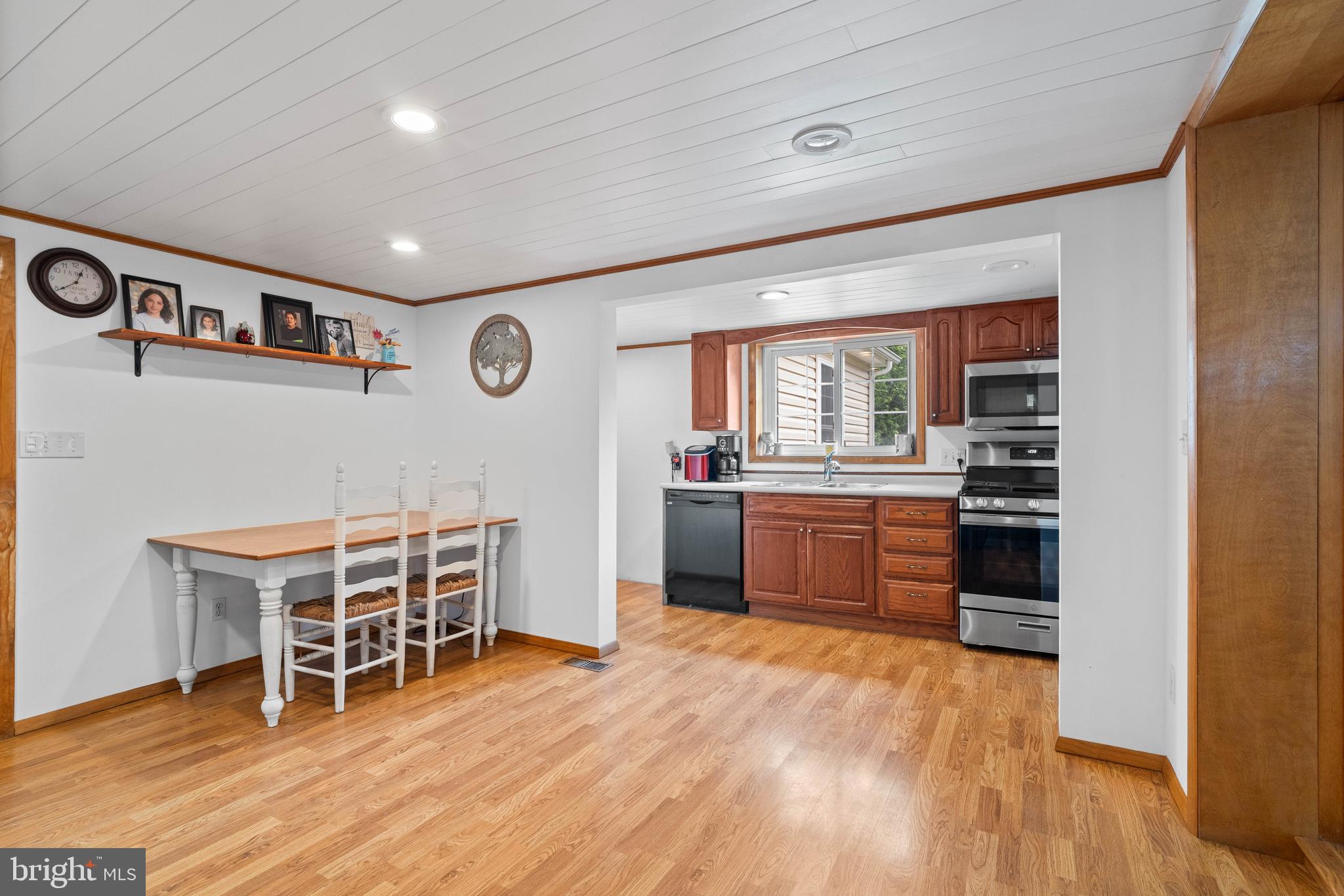 609 Elizabeth Street Houtzdale, PA 16651 - Photo 11 of 22 a room with furniture a wooden floor and a window