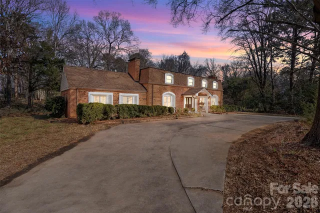 a street view with large house