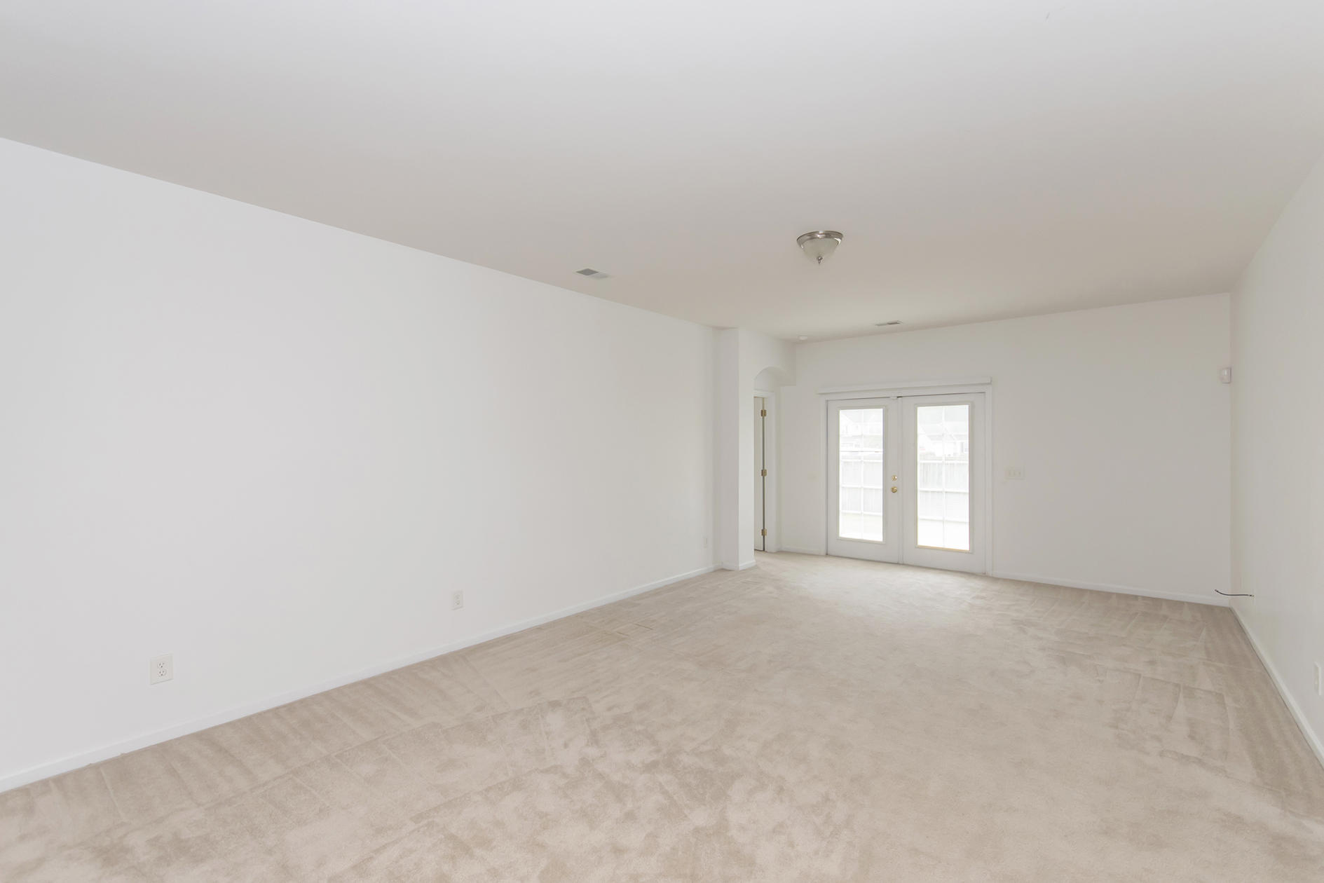 261 Westbrooke Road Summerville, SC 29486 - Photo 4 of 26 Den with patio doors leading to backyard