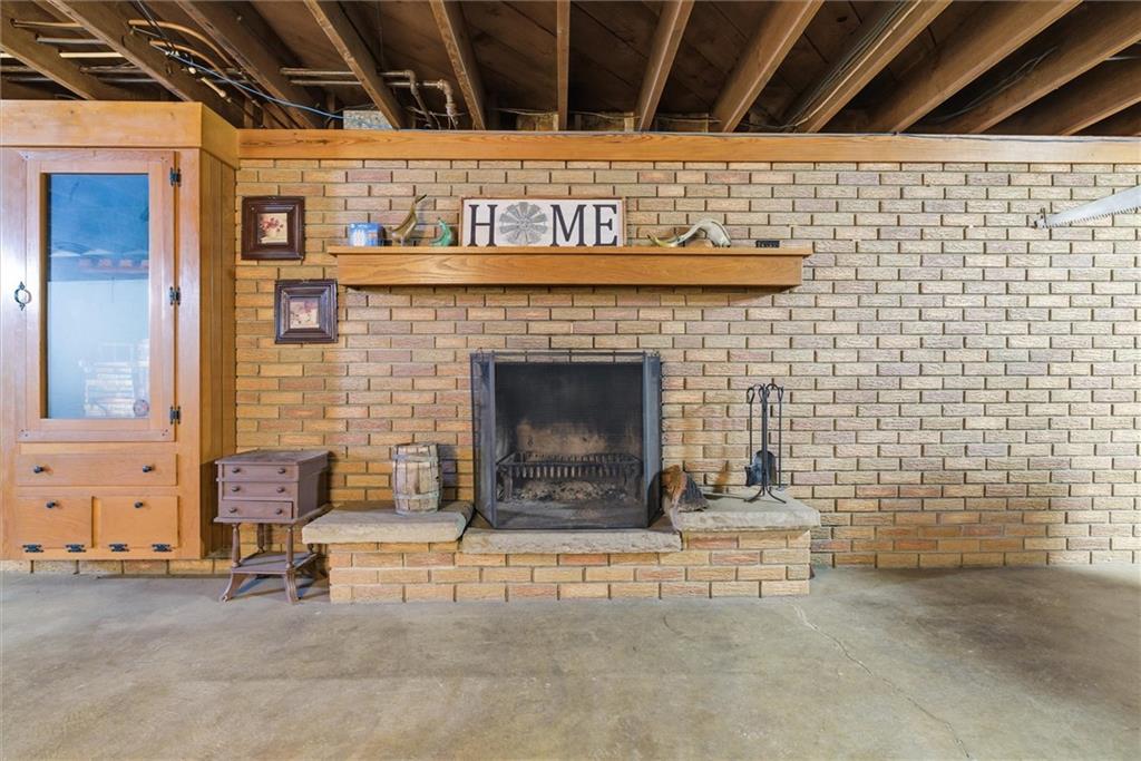 312 Flatwoods Road Vanderbilt, PA 15486 - Photo 33 of 48 a living room with a fireplace