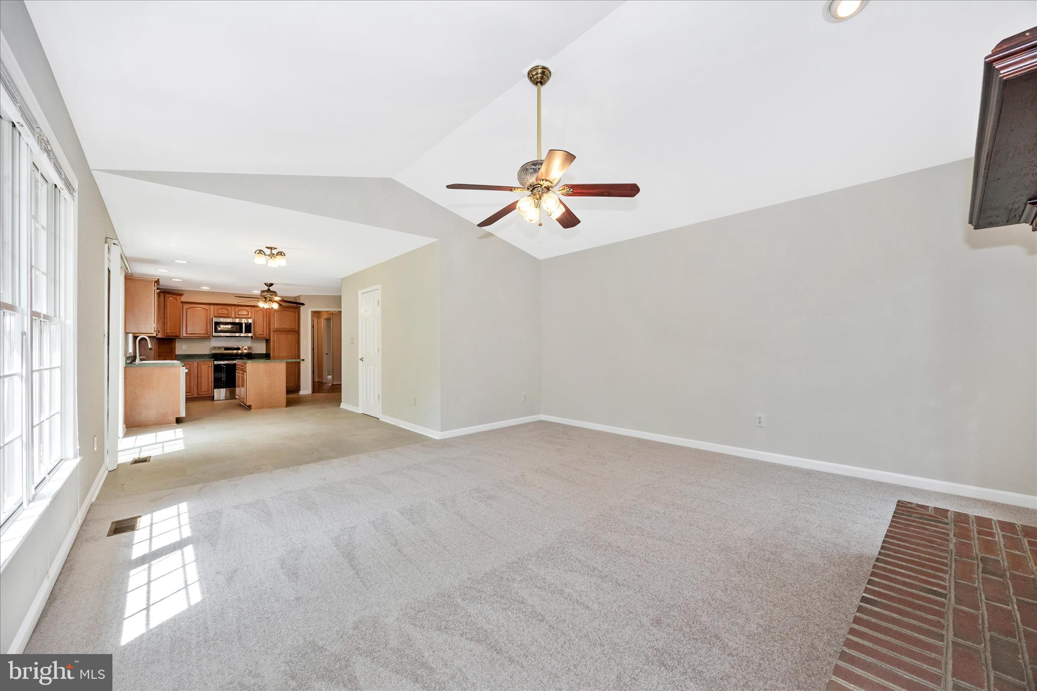 10393 Liberty Road Frederick, MD 21701 - Photo 26 of 47 a view of a livingroom with furniture and a ceiling fan