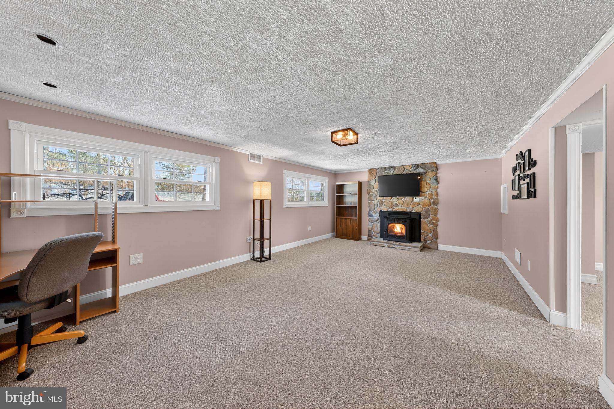 715 Darley Road Claymont, DE 19703 - Photo 10 of 43 Spacious family room with cozy fireplace.